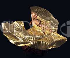 Beauty blond woman dance with flying gold wing