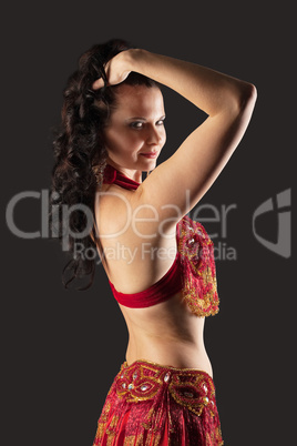 Woman dance in red oriental arabia costume