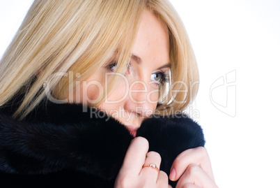 Young woman in fur coat