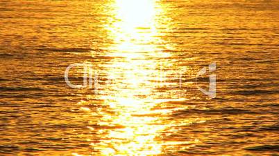 Golden Sunset Over Gentle Ocean