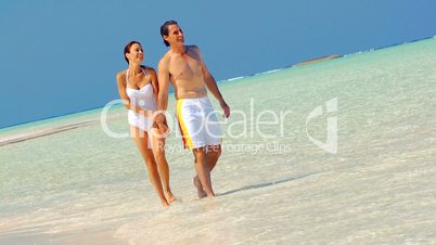 Attractive Couple in Swimwear on Island Vacation
