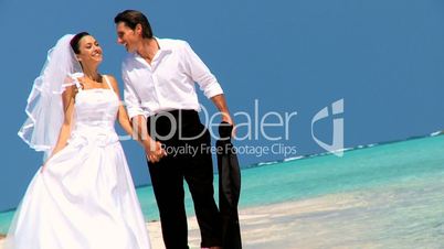 Bridal Couple on Beach After Dream Wedding