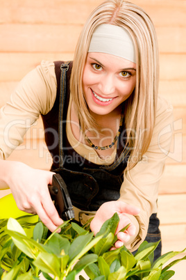 Gardening woman watering plants in spring