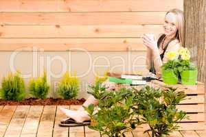 Garden woman terrace enjoy cup coffee spring