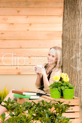 Garden woman terrace enjoy cup coffee spring