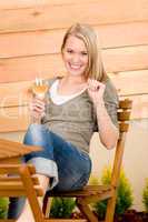 Garden happy woman enjoy glass wine terrace