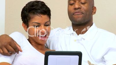 Couple Using Wireless Internet Communication in Close-up