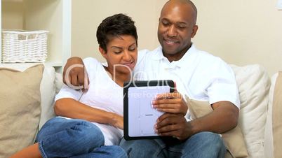 African American Couple Using Online Webchat