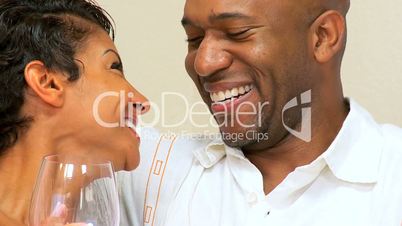 Ethnic Couple in Close-up with a Glass of  Wine