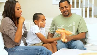 African American Boy Playing at Home with Parents