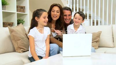 Family Using Internet Webchat