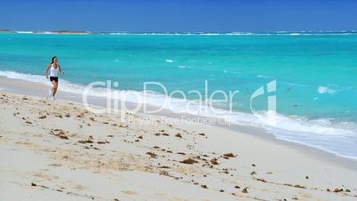 Healthy Female Jogging on the Beach