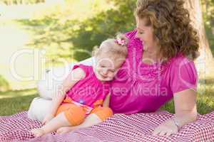 Mother and Daughter on Blanket in the Park