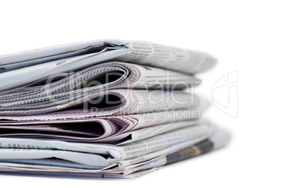 Newspapers on a white background