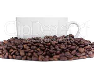 Cup of coffee surrounded with coffee beans