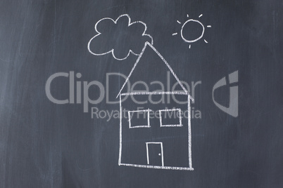 House with sun and cloud on a blackboard