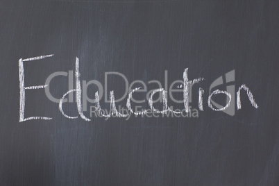 Blackboard with "education" written on it