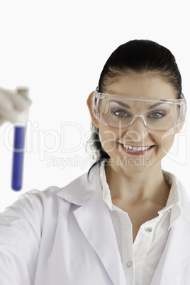 Smiling scientist looking at the camera