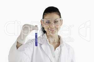 Smiling female scientist looking at the camera
