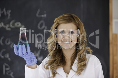 Young female scientist looking at the camera