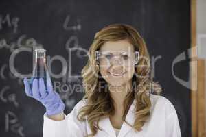 Young female scientist looking at the camera