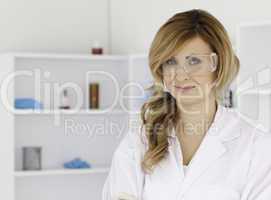Attractive blond-haired scientist posing
