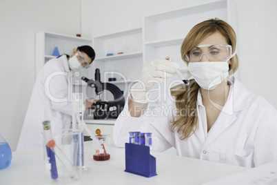 Scientists carrying out an experiment