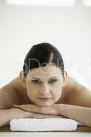 Dark-haired woman getting a spa treatment