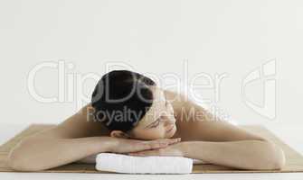 Attractive dark-haired woman getting a spa treatment