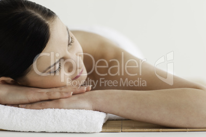 Beautiful dark-haired woman getting a spa treatment