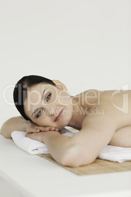 Attractive dark-haired woman relaxing