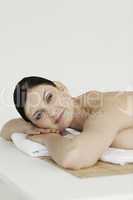 Attractive dark-haired woman relaxing