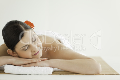 Cute dark-haired woman getting a spa treatment