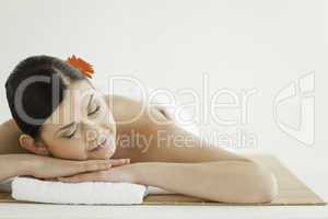 Cute dark-haired woman getting a spa treatment