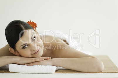 Attractive dark-haired woman getting a spa treatment