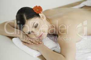Pretty dark-haired woman getting a spa treatment