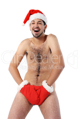 Sexy muscular man wearing a Santa Claus hat