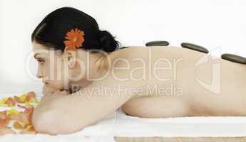 Brunette enjoying the procedure of massage