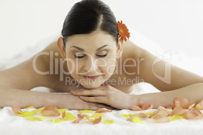 Beautiful dark-haired woman enjoying the relaxation