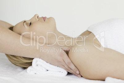 Lovely blond-haired woman lying down