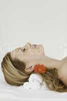 Young and attractive blond-haired woman lying down