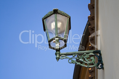 the lantern on the wall in the historic