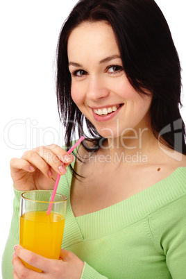 Young attractive woman drinks orange juice