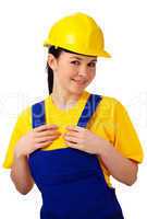 Young beautiful woman in construction uniform