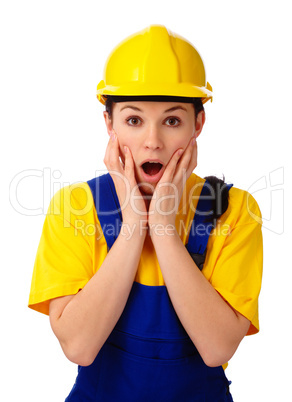 Construction girl holding her face in astonishment