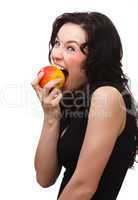 Young attractive woman is biting an apple