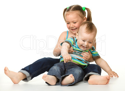 Two children is having fun