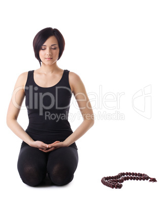 Young woman relax after yoga with beads isolated