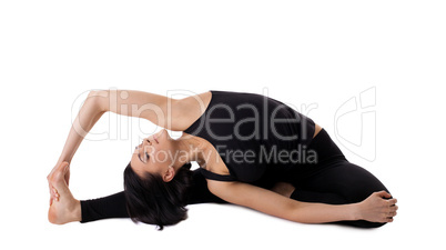 woman sit in yoga pose - Parivrtta Janu Sirsasana