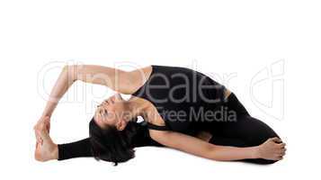 woman sit in yoga pose - Parivrtta Janu Sirsasana
